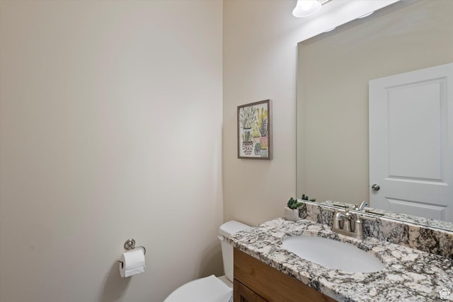 7982 N Bristlecone Rd, Eagle Mountain, UT 84005 - half bathroom featuring toilet and vanity