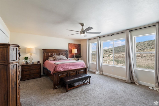 7982 N Bristlecone Rd, Eagle Mountain, UT 84005 - bedroom featuring light carpet and a ceiling fan