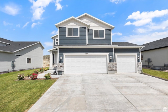 7982 N Bristlecone Rd, Eagle Mountain, UT 84005 - view of front of home with a front yard, stone siding, concrete driveway, and a garage