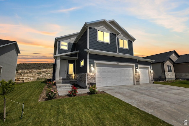 7982 N Bristlecone Rd, Eagle Mountain, UT 84005 - view of front of home featuring a front yard, stone siding, driveway, and a garage