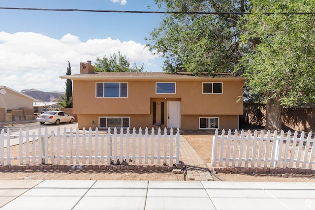 577 W 400 S, Hurricane, UT 84737 - raised ranch featuring stucco siding and a fenced front yard