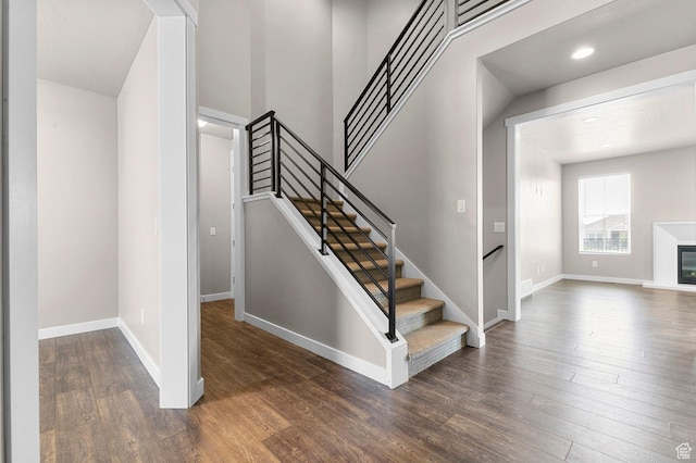 1298 E Salt Creek Peak, Eagle Mountain, UT 84005 - staircase featuring wood finished floors and recessed lighting