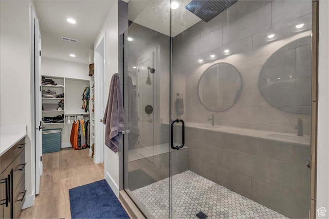 992 S Mulberry Dr, Toquerville, UT 84774 - bathroom featuring vanity, a shower stall, wood finished floors, a walk in closet, and recessed lighting