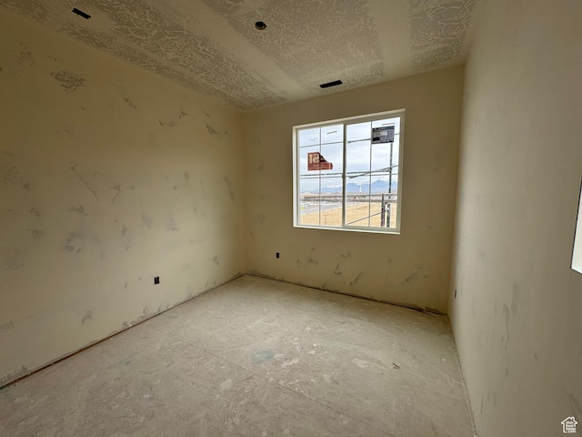 895 W Hobble Creek Ct S Unit 90, Springville, UT 84663 - unfurnished room featuring a textured ceiling