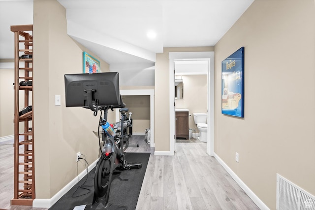 369 E 9th Ave, Salt Lake City, UT 84103 - exercise room featuring wood finished floors and baseboards