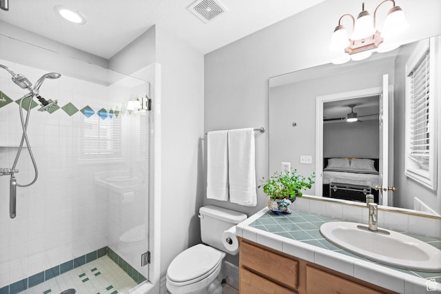 369 E 9th Ave, Salt Lake City, UT 84103 - bathroom featuring a stall shower, ensuite bathroom, vanity, and ceiling fan