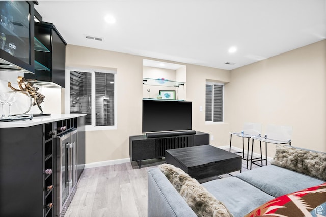 369 E 9th Ave, Salt Lake City, UT 84103 - living room featuring light wood-style flooring and recessed lighting