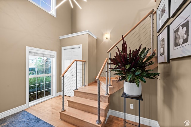 369 E 9th Ave, Salt Lake City, UT 84103 - foyer entrance featuring stairway, wood finished floors, and a towering ceiling