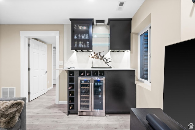369 E 9th Ave, Salt Lake City, UT 84103 - indoor bar featuring beverage cooler and light wood-style flooring