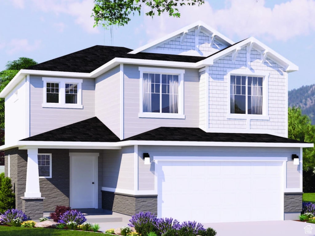 691 N 600 W Unit 116, Tremonton, UT 84337 - craftsman-style house with an attached garage, a shingled roof, driveway, and stone siding