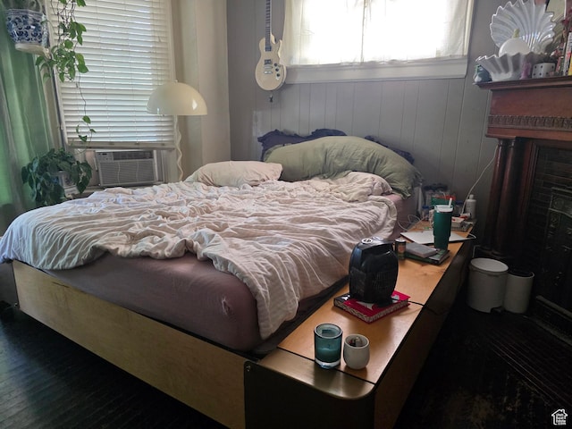 423 E 1st Ave N, Salt Lake City, UT 84103 - bedroom with wood finished floors, a fireplace, and cooling unit