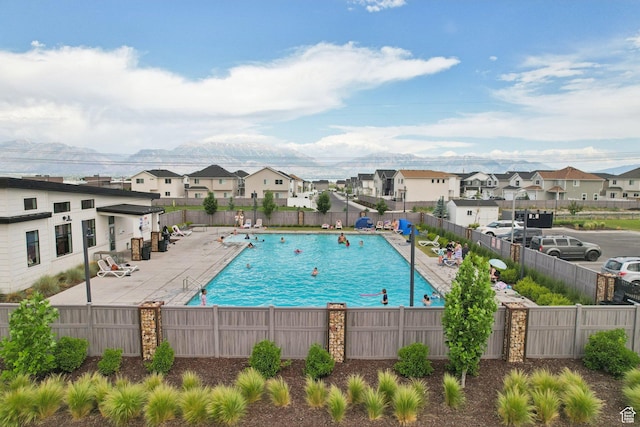 7215 N Clear Meadow Way, Eagle Mountain, UT 84005 - community pool featuring a residential view and a patio