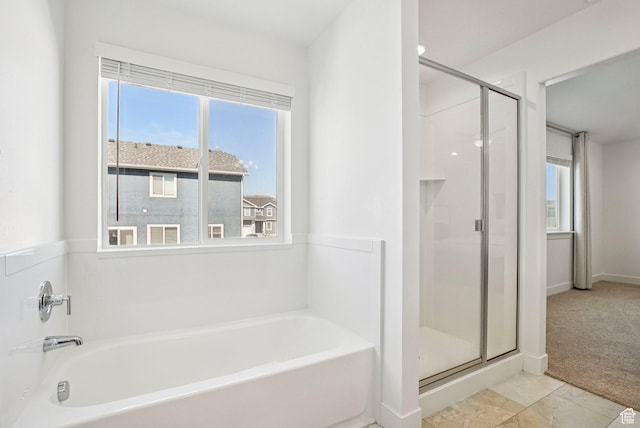 7215 N Clear Meadow Way, Eagle Mountain, UT 84005 - bathroom featuring a shower stall, a bath, and plenty of natural light