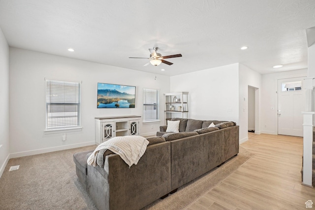 7215 N Clear Meadow Way, Eagle Mountain, UT 84005 - living room with ceiling fan, recessed lighting, and light wood-style floors