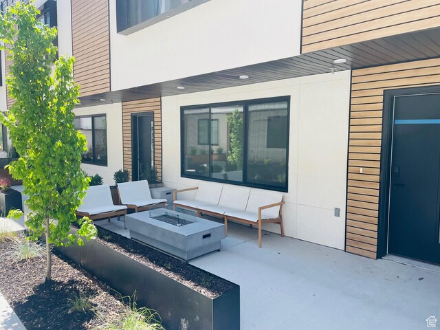 4186 S Main St Unit O217, Millcreek, UT 84107 - view of patio / terrace featuring a fire pit
