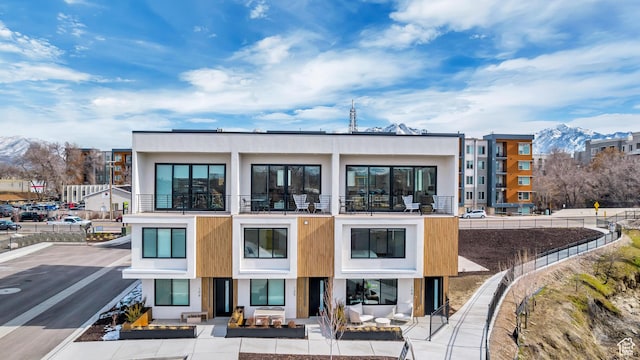 4186 S Main St Unit O217, Millcreek, UT 84107 - view of building exterior with a mountain view