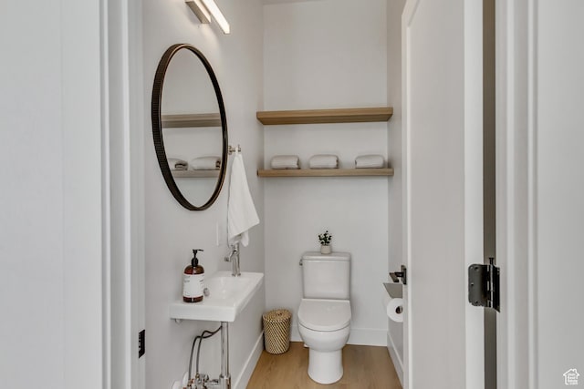 4186 S Main St Unit O217, Millcreek, UT 84107 - bathroom with toilet and wood finished floors