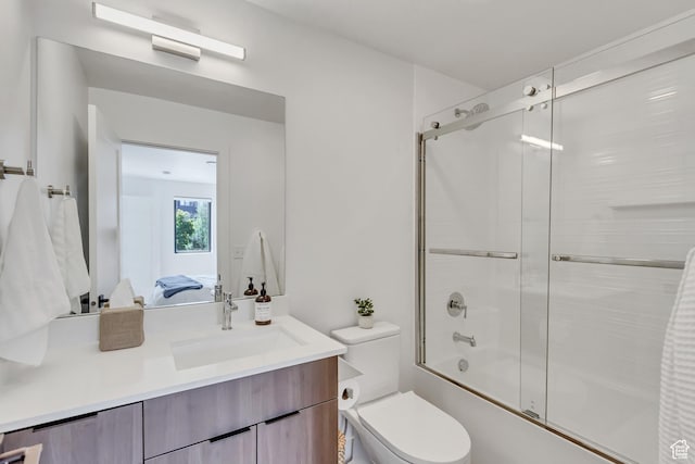 4186 S Main St Unit O217, Millcreek, UT 84107 - full bathroom featuring connected bathroom, enclosed tub / shower combo, and vanity