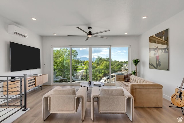 4186 S Main St Unit O217, Millcreek, UT 84107 - living room with a wall unit AC, plenty of natural light, a ceiling fan, wood finished floors, and recessed lighting