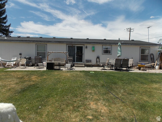 165 S 200th Ct W, Vernal, UT 84078 - rear view of property with a patio and a lawn