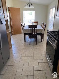 165 S 200th Ct W, Vernal, UT 84078 - dining space with a chandelier