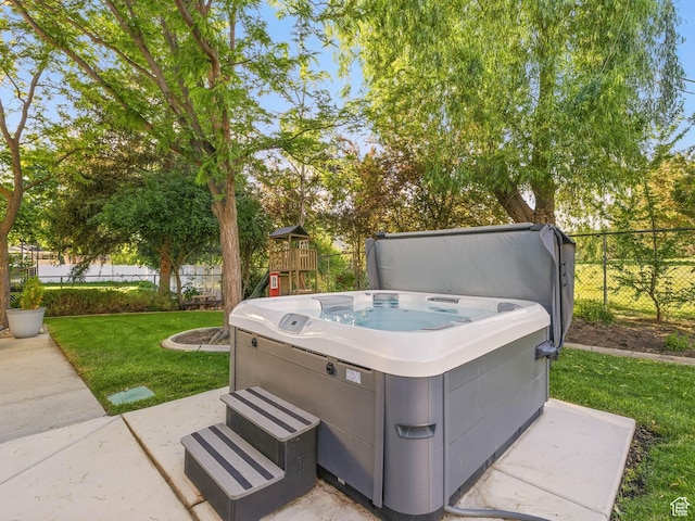 1705 E Plata Way, Sandy, UT 84093 - view of patio / terrace featuring a hot tub and a playground