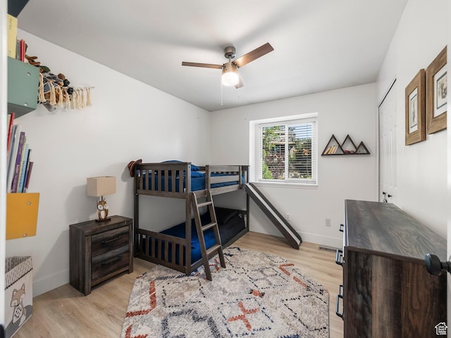 1705 E Plata Way, Sandy, UT 84093 - bedroom featuring light wood-style floors and a ceiling fan