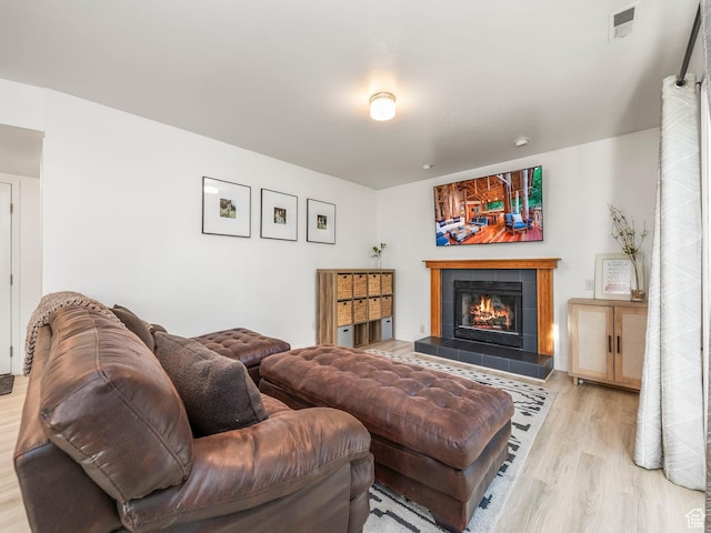1705 E Plata Way, Sandy, UT 84093 - living area with light wood finished floors and a tile fireplace