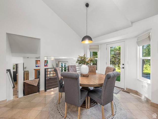 1705 E Plata Way, Sandy, UT 84093 - dining space featuring light tile patterned floors and high vaulted ceiling
