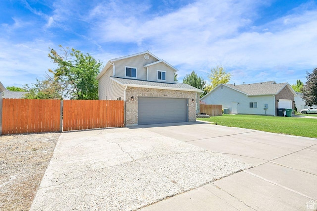 2817 W 1475 N, Layton, UT 84041 - traditional-style home featuring concrete driveway, brick siding, and an attached garage