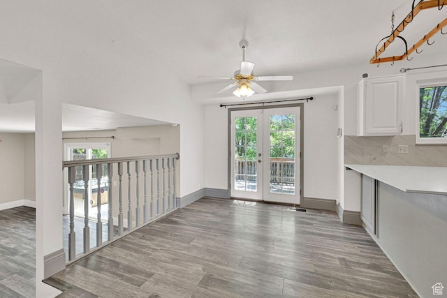 2817 W 1475 N, Layton, UT 84041 - unfurnished dining area with wood finished floors, plenty of natural light, and ceiling fan