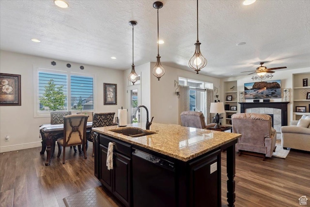 2892 W 2500 N, Clinton, UT 84015 - kitchen featuring black dishwasher, a textured ceiling, dark wood-style flooring, light stone countertops, and a breakfast bar