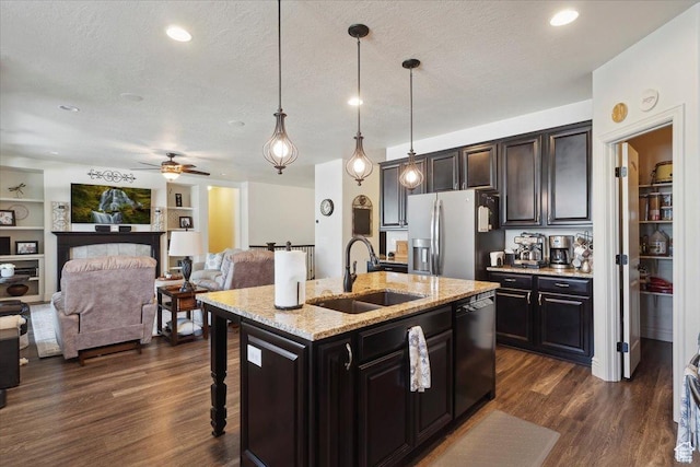 2892 W 2500 N, Clinton, UT 84015 - kitchen with stainless steel refrigerator with ice dispenser, dishwasher, dark wood-style floors, open floor plan, and pendant lighting