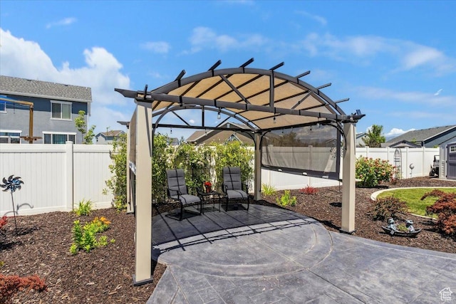 2892 W 2500 N, Clinton, UT 84015 - fenced backyard featuring a pergola and a patio