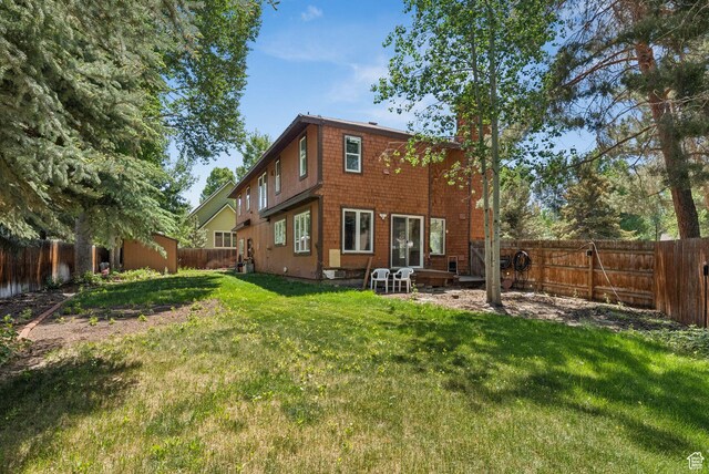 754 Quaking Aspen Ct, Park City, UT 84060 - back of property with a fenced backyard and a chimney