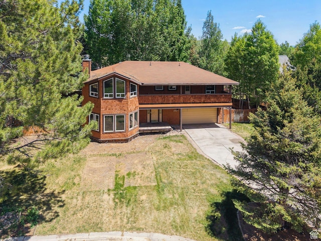 754 Quaking Aspen Ct, Park City, UT 84060 - rustic home with driveway, a chimney, and an attached garage