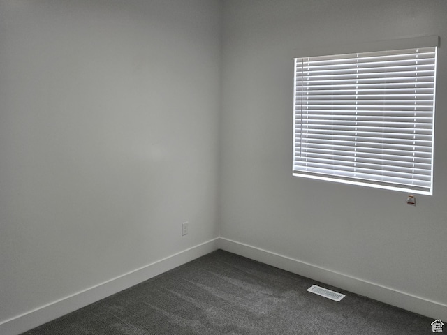 1561 S Sageberry Dr, Santaquin, UT 84655 - empty room featuring baseboards and dark colored carpet