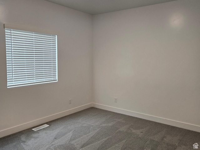 1561 S Sageberry Dr, Santaquin, UT 84655 - empty room with dark carpet and baseboards