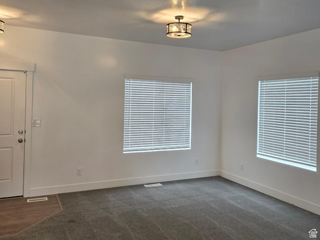 1561 S Sageberry Dr, Santaquin, UT 84655 - unfurnished room with dark carpet and baseboards