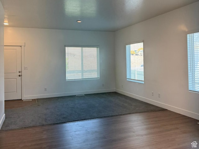 1561 S Sageberry Dr, Santaquin, UT 84655 - unfurnished room featuring healthy amount of natural light and dark wood-type flooring
