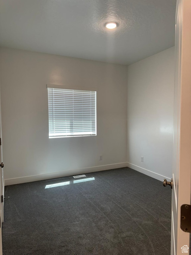 1561 S Sageberry Dr, Santaquin, UT 84655 - unfurnished room featuring dark colored carpet