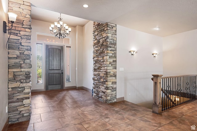 1285 Summerwood Cir, Santa Clara, UT 84765 - entrance foyer with a chandelier and ornate columns