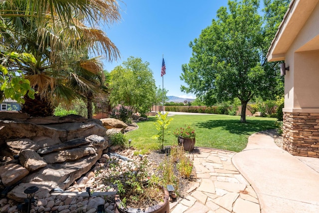 1285 Summerwood Cir, Santa Clara, UT 84765 - view of grassy yard featuring a patio area