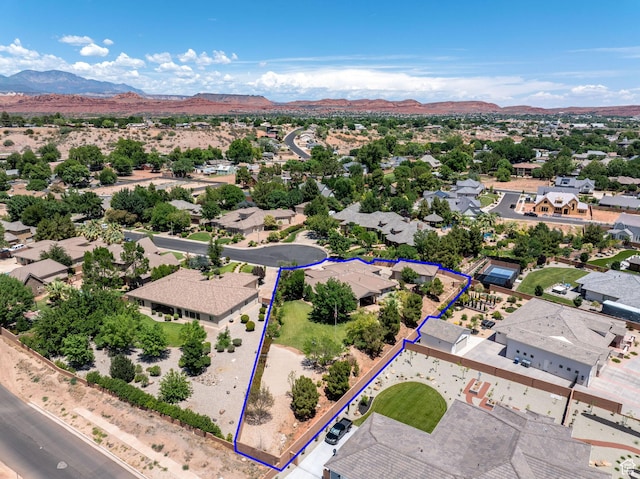 1285 Summerwood Cir, Santa Clara, UT 84765 - aerial perspective of suburban area with a mountain backdrop and property parcel outlined
