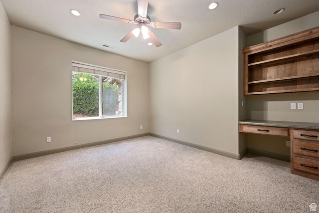 1285 Summerwood Cir, Santa Clara, UT 84765 - unfurnished office with built in desk, light carpet, recessed lighting, and ceiling fan