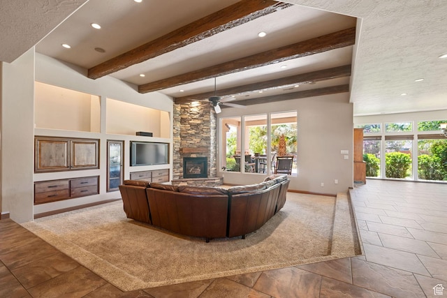 1285 Summerwood Cir, Santa Clara, UT 84765 - living area with a stone fireplace, recessed lighting, a ceiling fan, beam ceiling, and stone tile floors