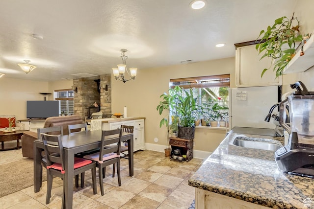 338 S Holdaway Rd, Vineyard, UT 84059 - dining room featuring a chandelier and recessed lighting