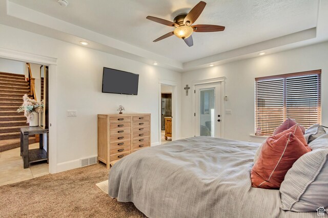 338 S Holdaway Rd, Vineyard, UT 84059 - bedroom with light carpet, recessed lighting, a ceiling fan, a tray ceiling, and access to outside