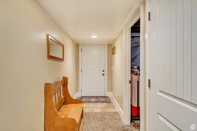 338 S Holdaway Rd, Vineyard, UT 84059 - doorway to outside featuring light colored carpet and light tile patterned floors
