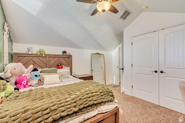 338 S Holdaway Rd, Vineyard, UT 84059 - bedroom with light colored carpet, vaulted ceiling, a closet, and a ceiling fan
